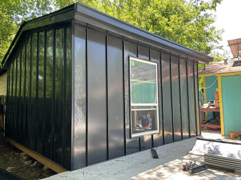 Black standing seam metal wall panels for Roof Inspection in Roanoke